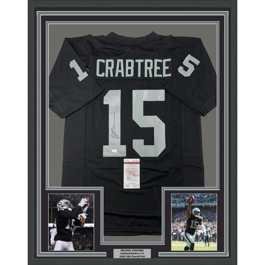 Framed autographed Michael Crabtree Oakland Raiders black jersey back with silver 15 Crabtree JSA COA