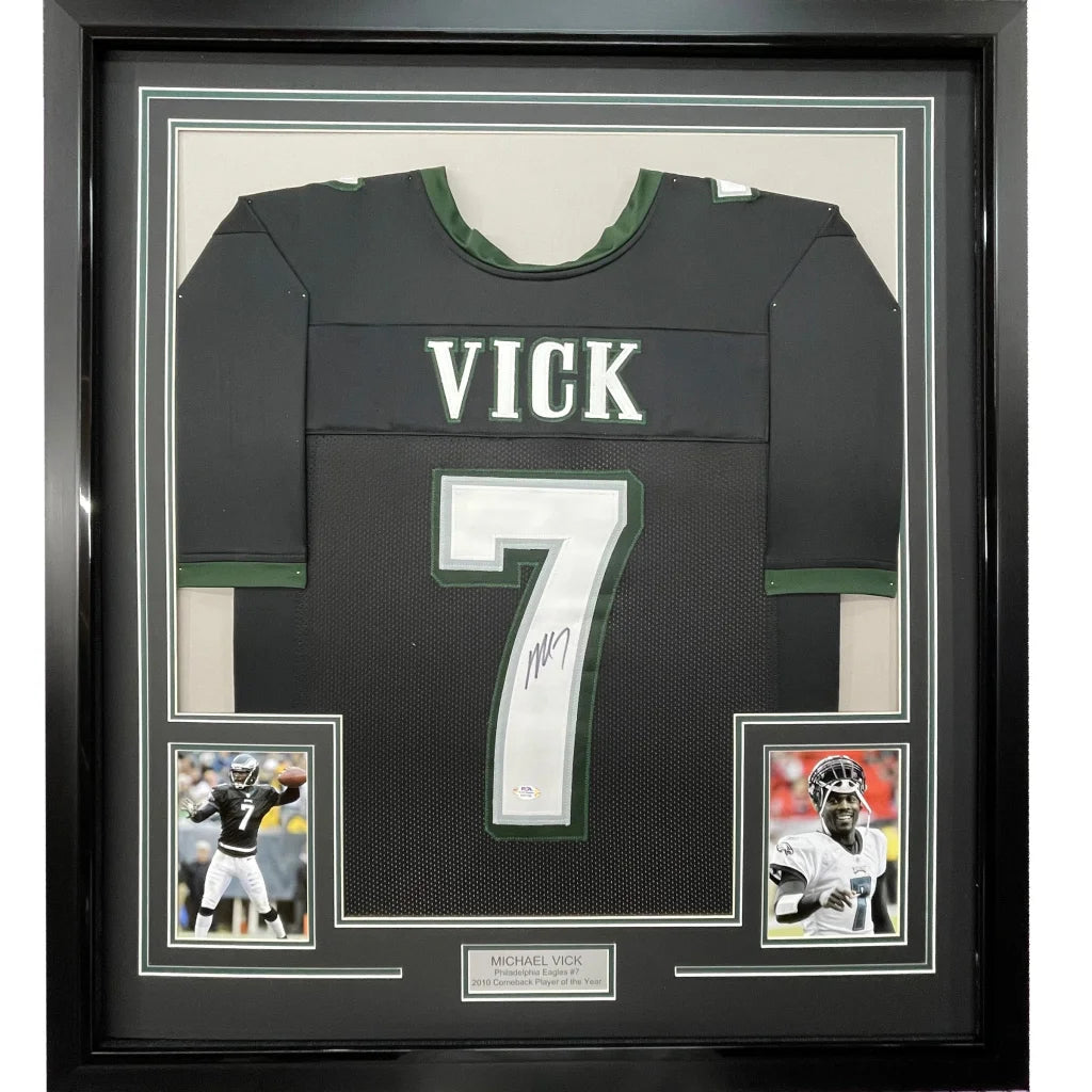 Framed autographed Michael Vick black Philadelphia Eagles jersey number 7 with PSA/DNA COA