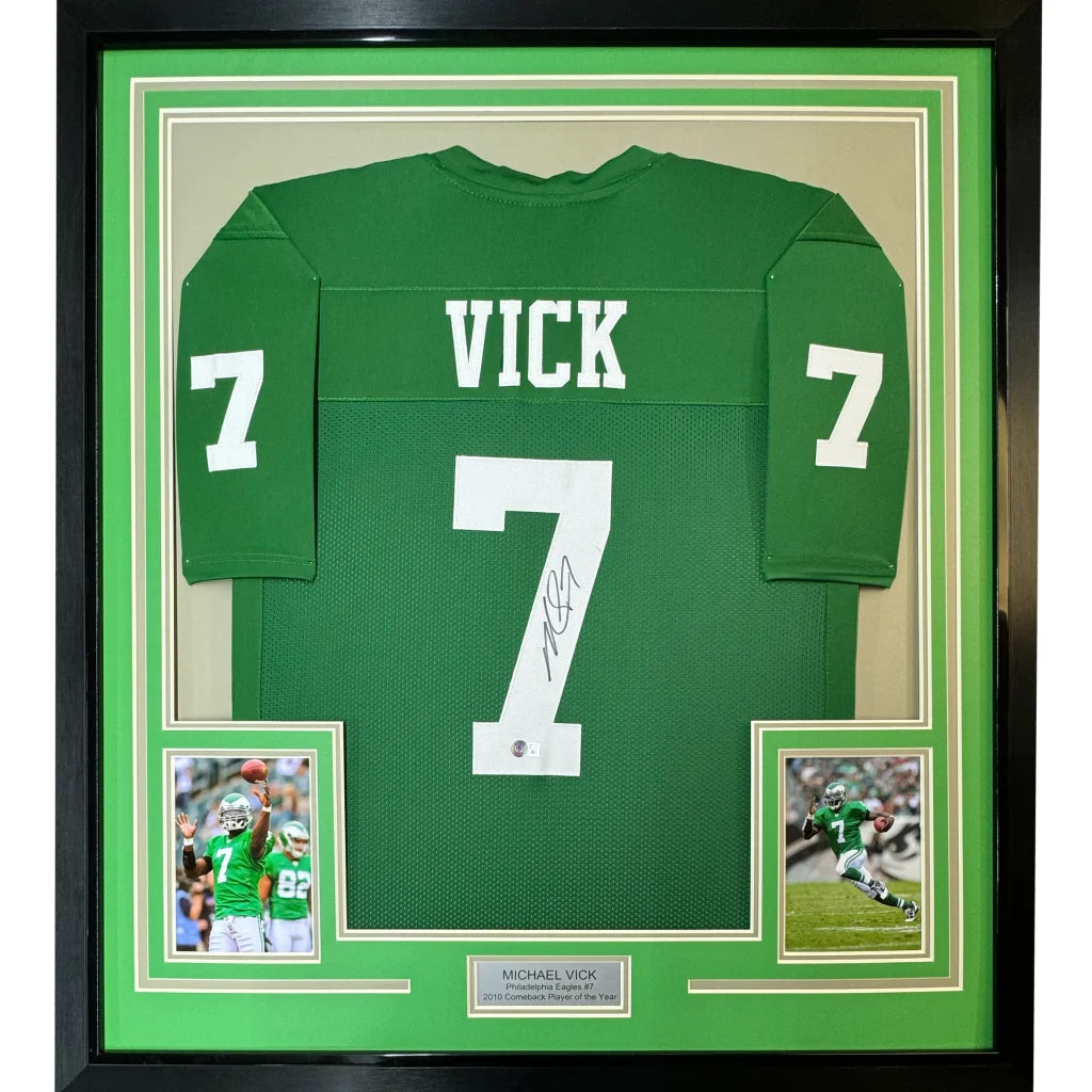 Framed autographed Michael Vick green Eagles jersey with number 7 and Vick name