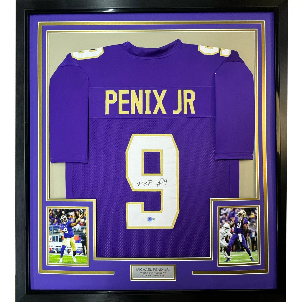 Back view of a purple washington huskies college football jersey with gold lettering signed by michael penix jr framed 35x39