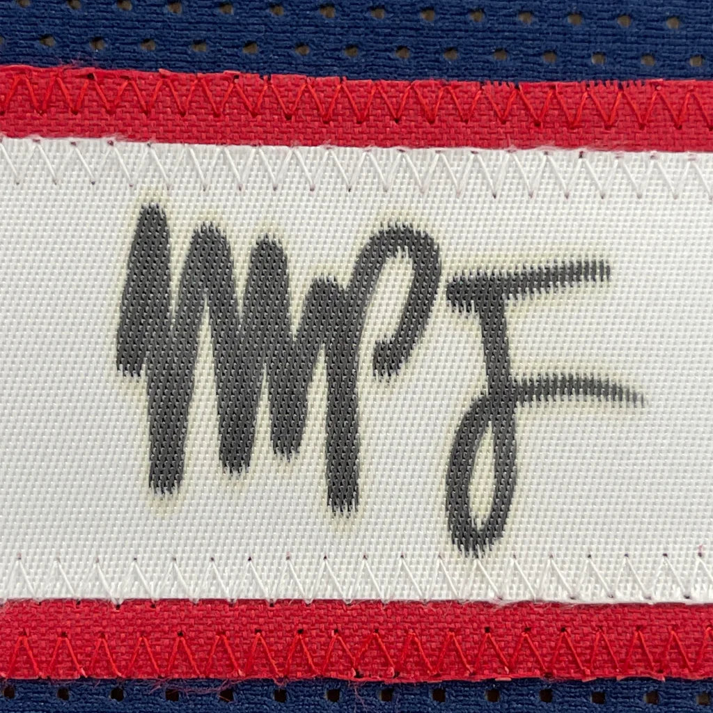 Autographed Michael Jordan jersey tag on professionally framed Denver dark blue basketball collectible