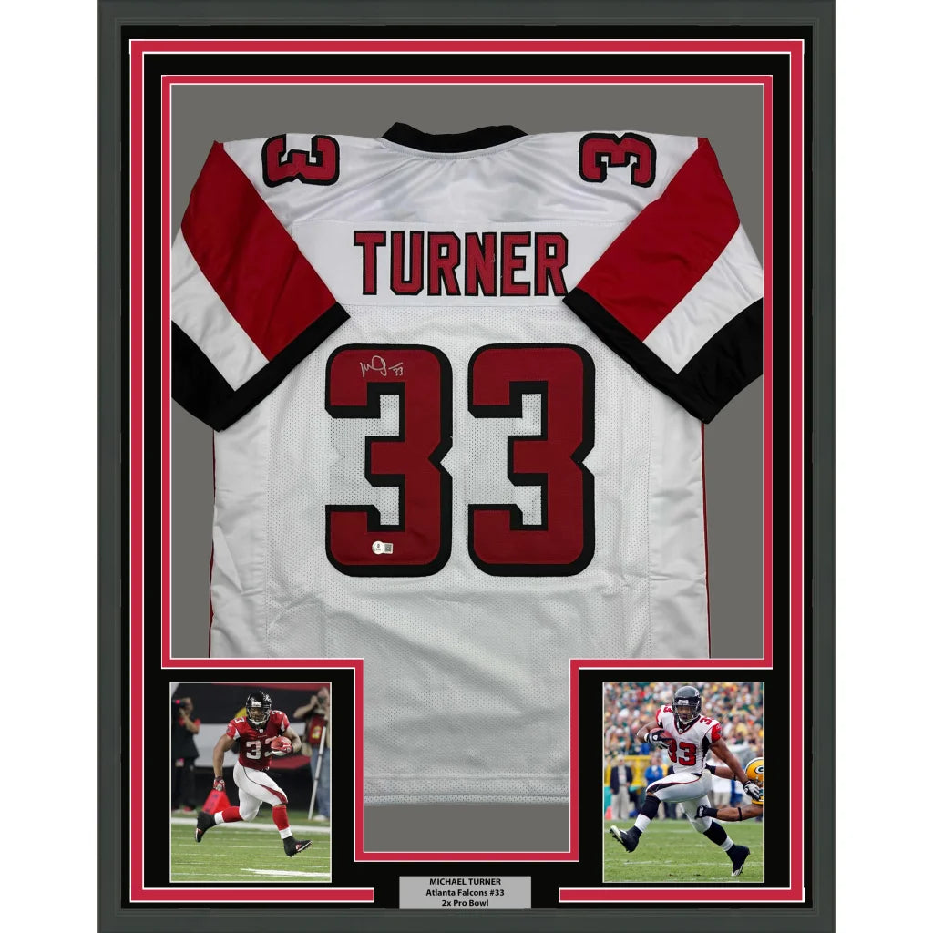 Framed Autographed Michael Turner 35x39 Atlanta White Football Jersey Beckett BAS COA | Hall of Fame Sports Memorabilia | vintageantiquesgifts.com