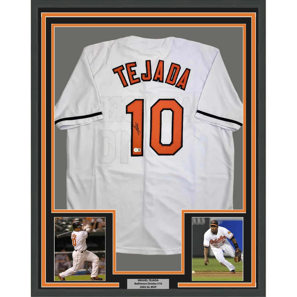 Framed Autographed Miguel Tejada 35x39 Baltimore White Baseball Jersey Beckett BAS COA | Hall of Fame Sports Memorabilia | vintageantiquesgifts.com