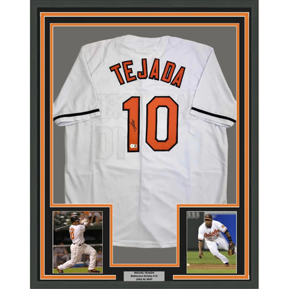 Framed Autographed Miguel Tejada 35x39 Baltimore White Baseball Jersey Beckett BAS COA | Hall of Fame Sports Memorabilia | vintageantiquesgifts.com