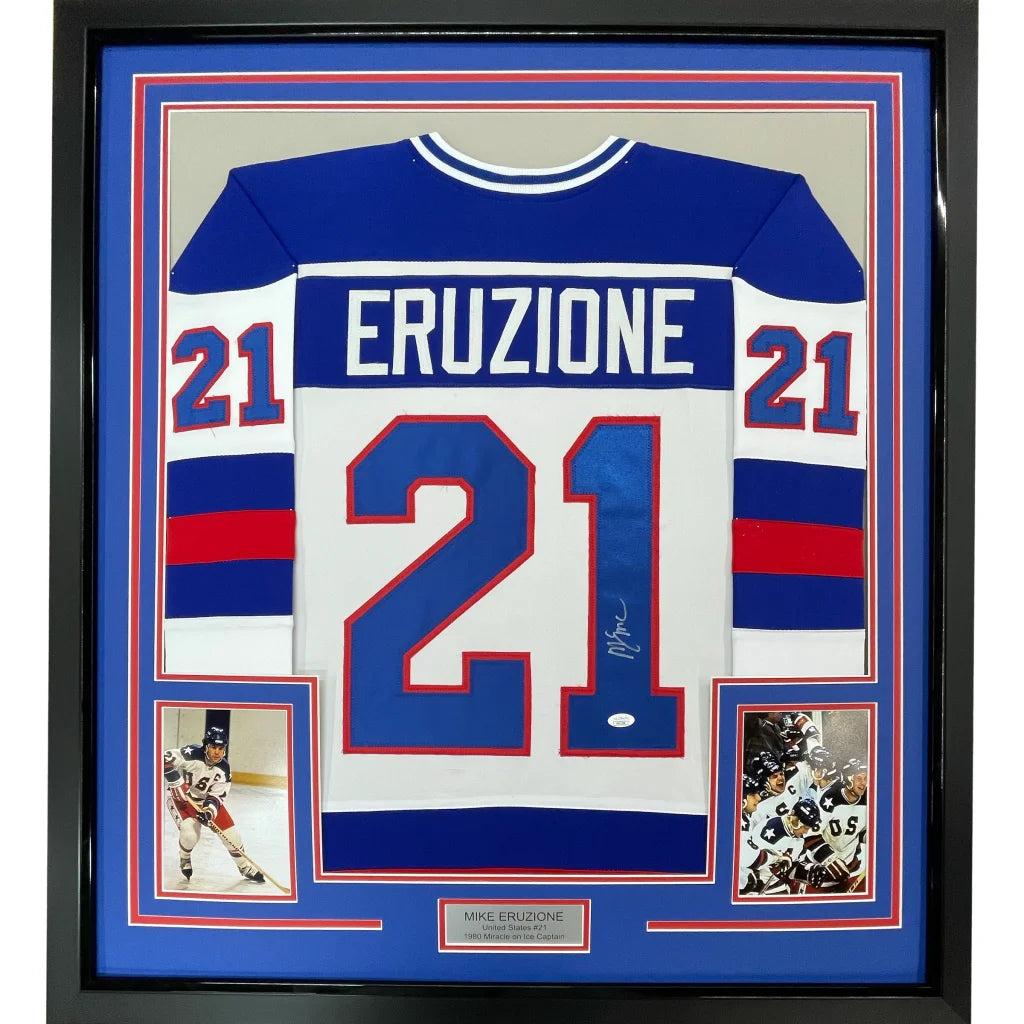 Framed autographed mike eruziu blue and white hockey jersey with red accents in black border 35x39 inches