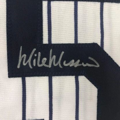 Autographed Mike Mussina Yankees jersey with photos ready to display