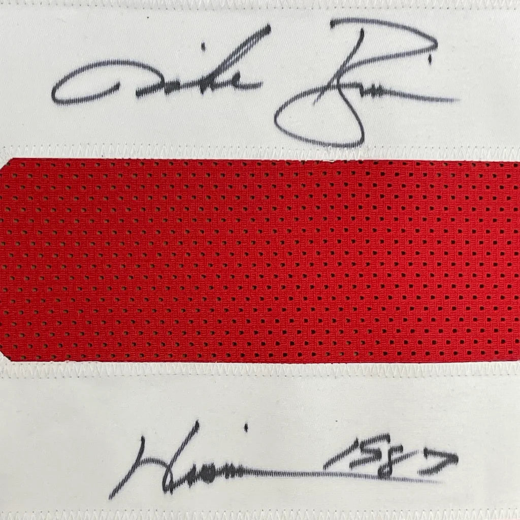 Autographed red and white Mike Rozier jersey with player photos display