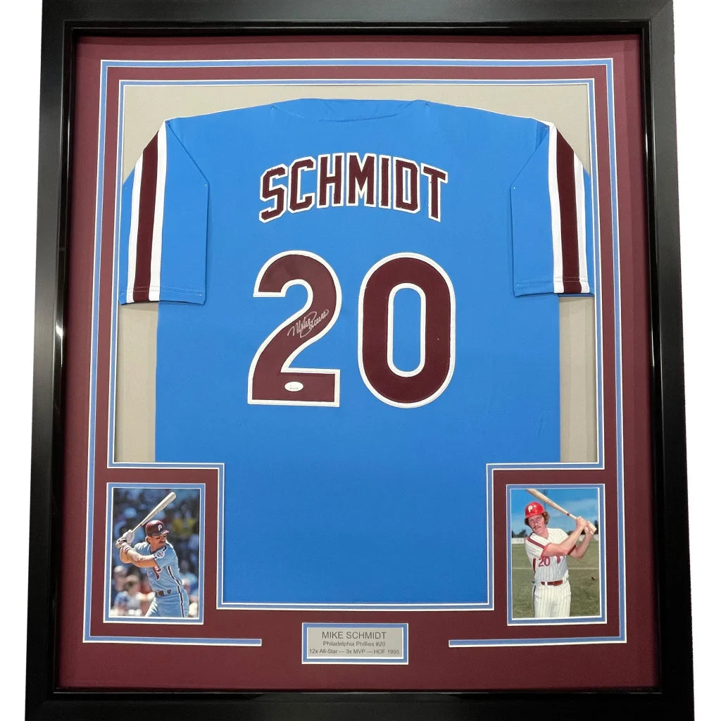 Framed Mike Schmidt autographed baseball jersey with photos on display