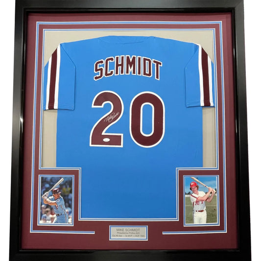 Framed Mike Schmidt autographed baseball jersey with photos on display
