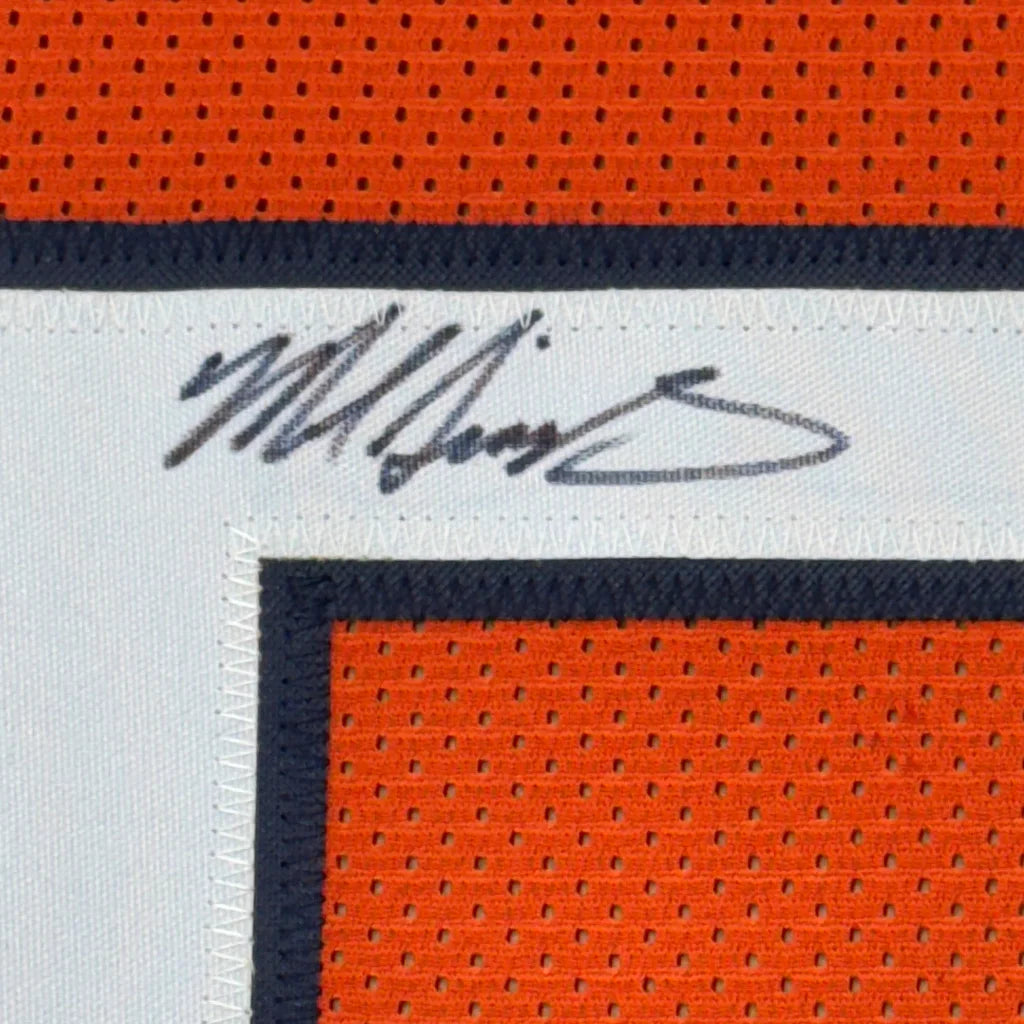 Autographed orange Bears jersey signed by Mike Singletary ready for display