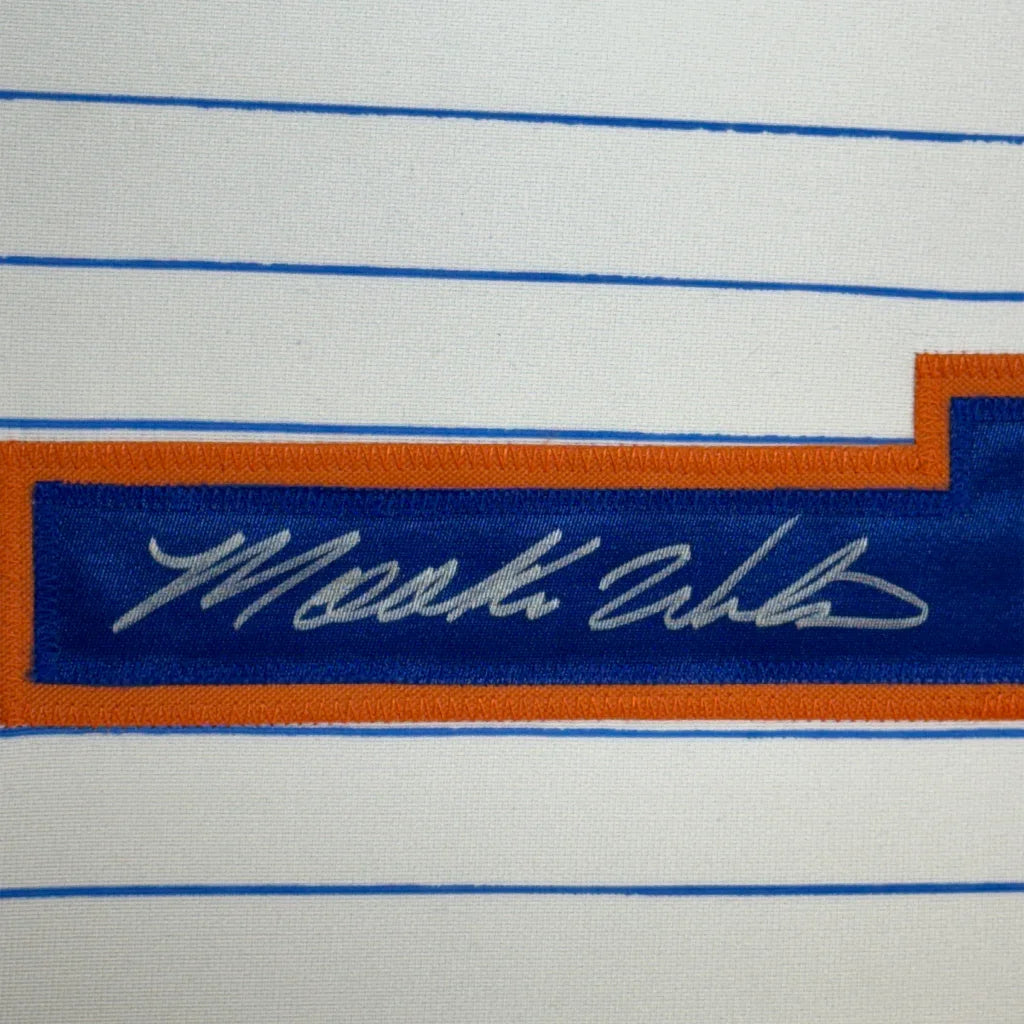 Framed signed Mookie Wilson New York Pinstripe jersey with white polo shirt, blue orange stripes, Maurice Gibb patch