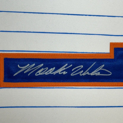 Framed signed Mookie Wilson New York Pinstripe jersey with white polo shirt, blue orange stripes, Maurice Gibb patch