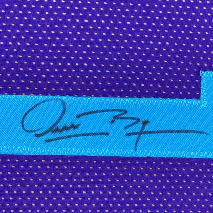 Framed Autographed Muggsy Bogues 35x39 Charlotte Purple Modern Basketball Jersey Beckett BAS COA | Certified Authentic Signed Memorabilia | vintageantiquesgifts.com