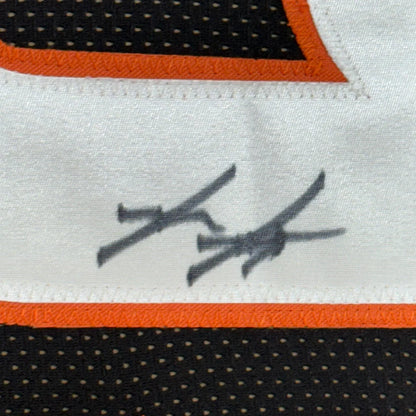 Professionally framed Cincinnati black football jersey with white and black design and signature