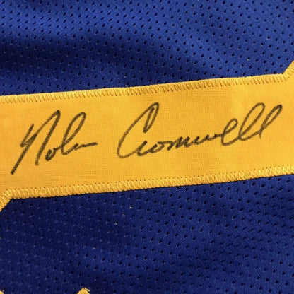 Framed autographed Nolan Cromwell LA Rams blue jersey with yellow stripe