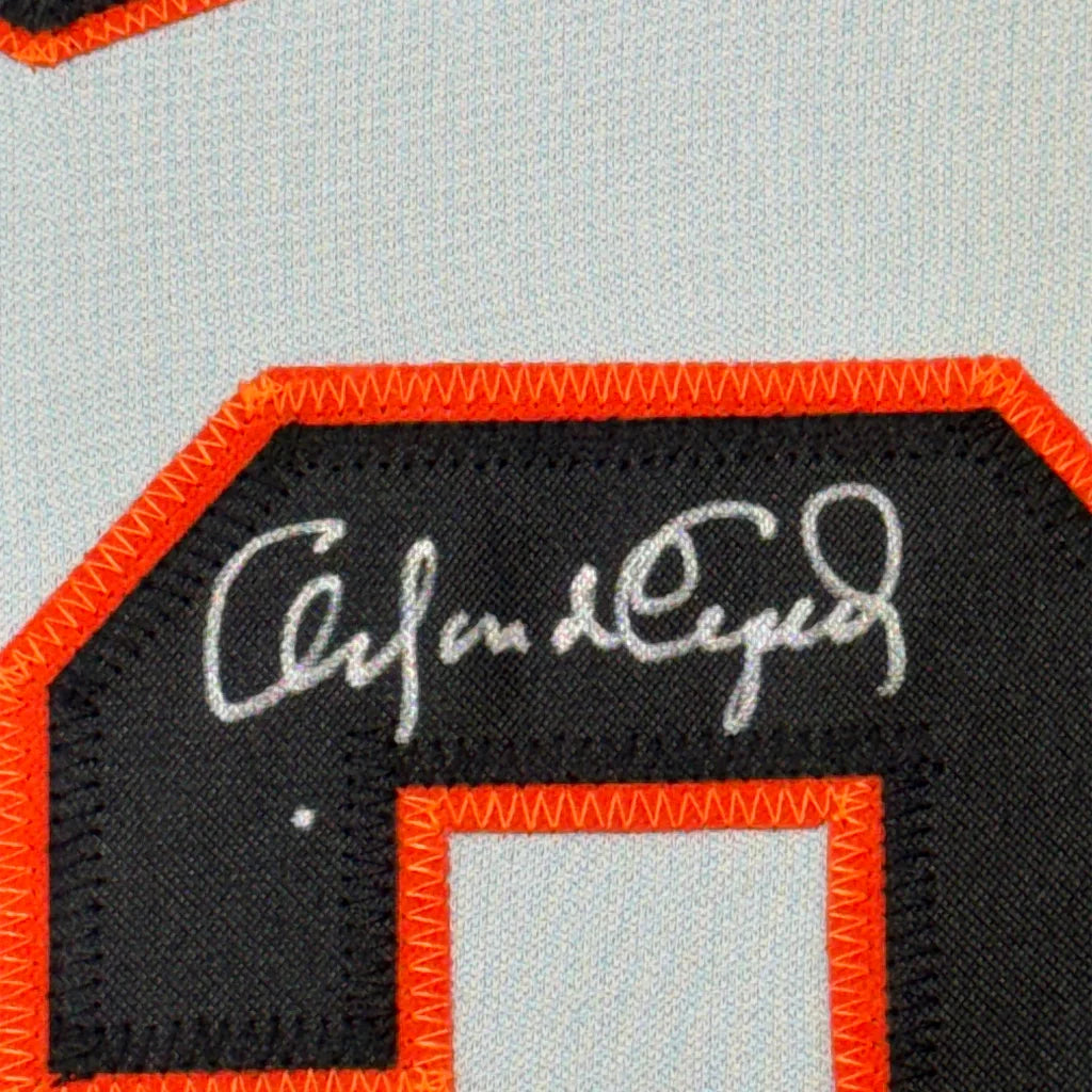 Framed autographed Orlando Cepeda San Francisco Giants jersey with black and orange embroidered patch