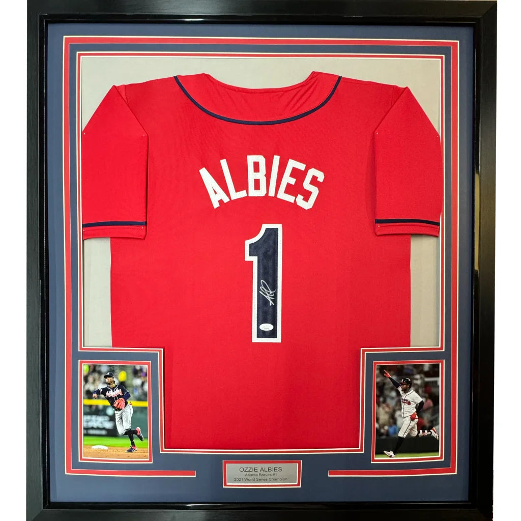 Framed autographed Ozzie Albies red Atlanta Braves jersey with number 1 and JSA COA