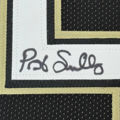 Framed Autographed Pat Swilling 35x39 New Orleans Black Football Jersey JSA COA | Certified Authentic Signed Memorabilia | vintageantiquesgifts.com