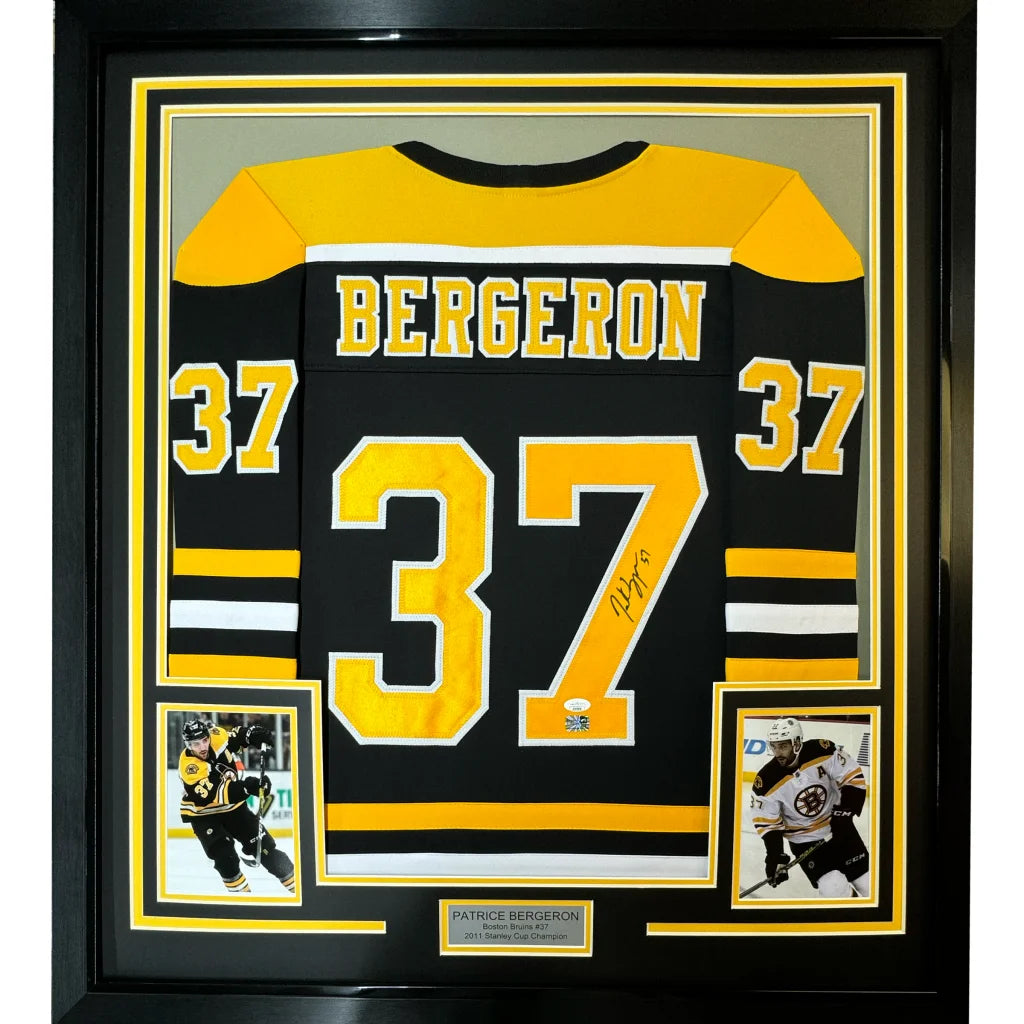 Framed autographed Patrice Bergeron black Boston Bruins jersey with number 37