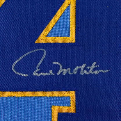 Blue fabric with a gold-bordered blue triangle and a silver autograph on a Paul Molitor signed Brewers jersey