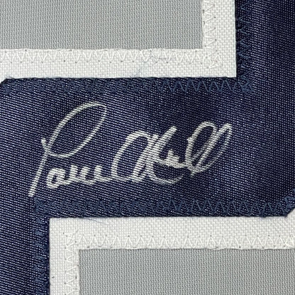 Dark blue fabric patch with white embroidery on professionally framed Paul ONeill York Grey Baseball Jersey
