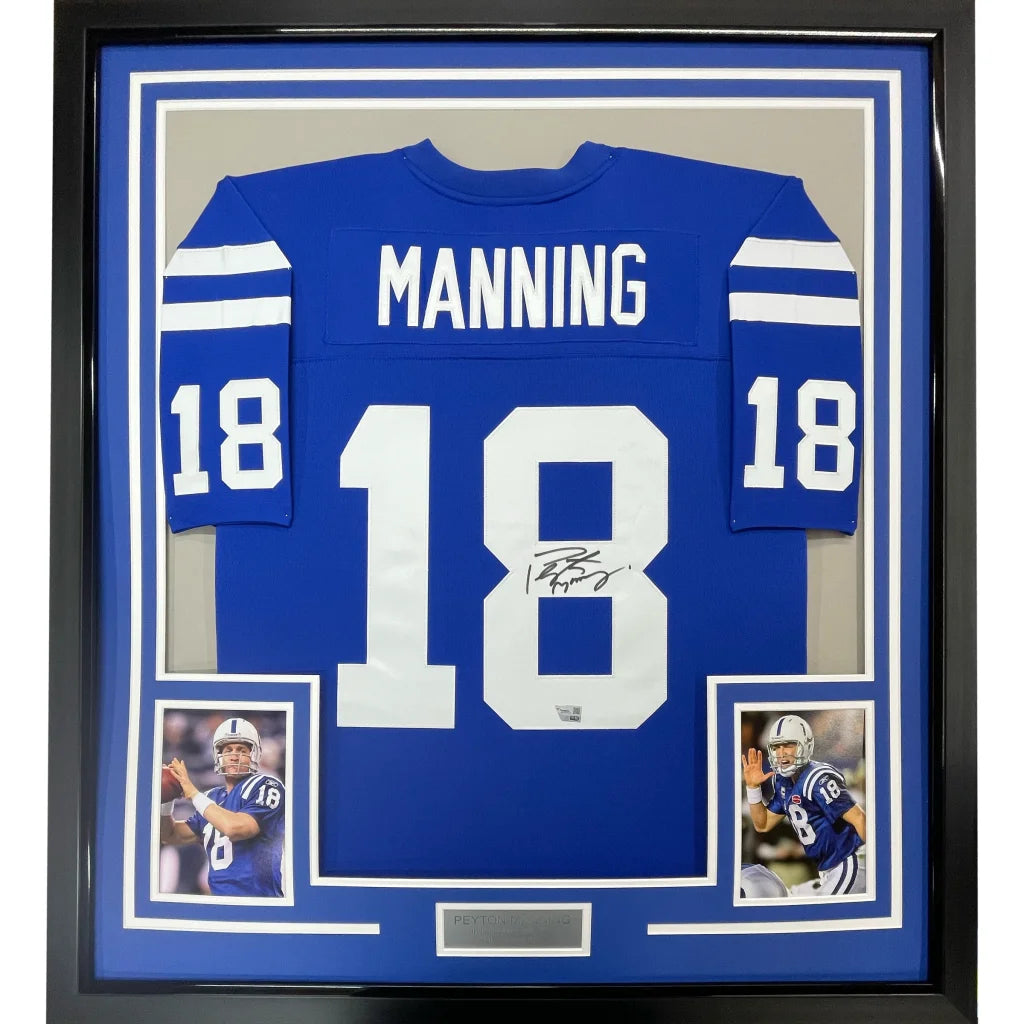 Framed Peyton Manning autographed Colts jersey with player photos display