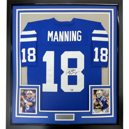 Framed Peyton Manning autographed Colts jersey with player photos display