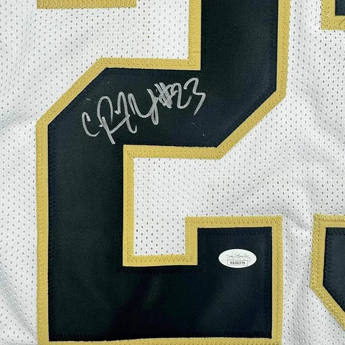 Framed autographed Pierre Thomas New Orleans white jersey back with black gold 2 JSA COA