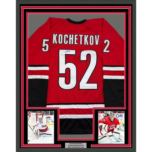 Framed Autographed Pyotr Kochetkov 35x39 Carolina Red Hockey Jersey JSA COA | Hall of Fame Sports Memorabilia | vintageantiquesgifts.com