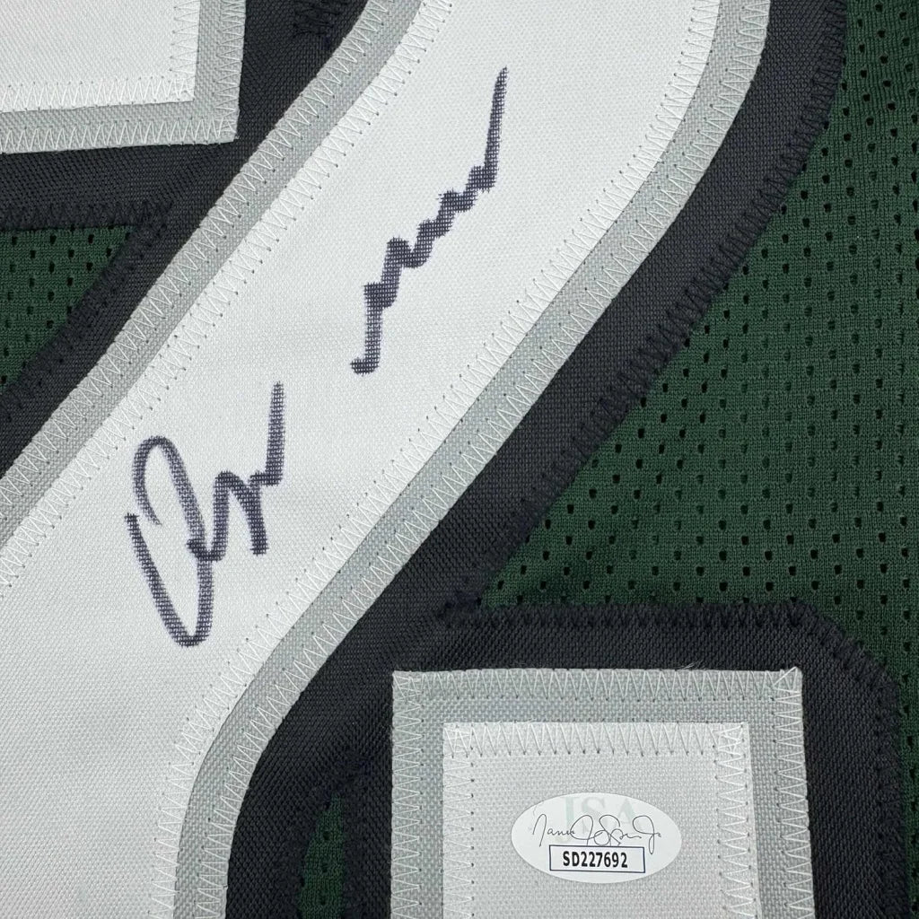 Autographed dark green Quinyon Mitchell Eagles jersey with JSA COA and professional framing