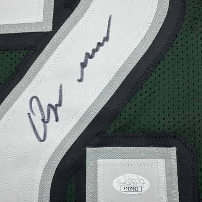Autographed dark green Quinyon Mitchell Eagles jersey with JSA COA and professional framing