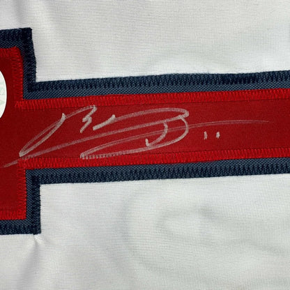 Framed autographed Rafael Devers Boston white baseball jersey with silver signature