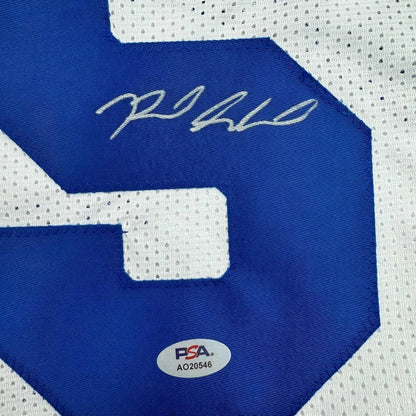 White jersey with blue 9, signed by Reed Sheppard, professionally framed for man cave