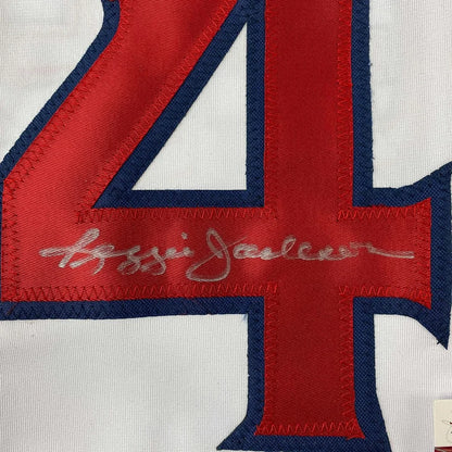 Autographed Reggie Jackson red and blue jersey number 4 ready to display
