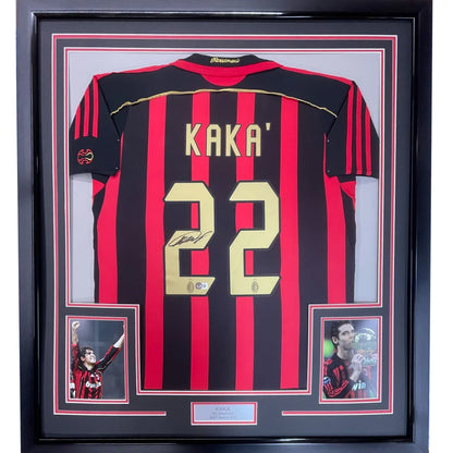 Framed Kaka AC Milan jersey with autograph and photos on display