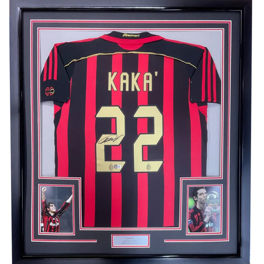 Framed Kaka AC Milan jersey with autograph and photos on display