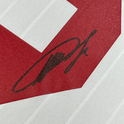 Framed autographed Ricardo Kaka AC Milan soccer jersey with black signature on red and white fabric, Beckett BAS COA