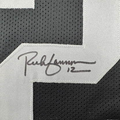 Black and white mesh football jersey featuring a signature patch framed signed by Rich Gannon with JSA COA
