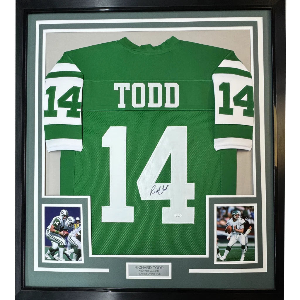 Framed autographed Richard Todd New York Jets jersey with team photos on display