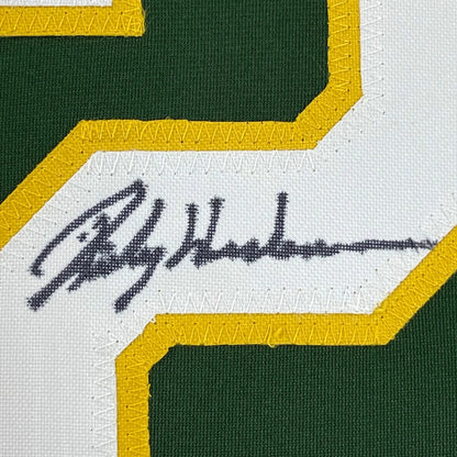 Autographed Rickey Henderson Jersey with stitched numbers and premium framing for display