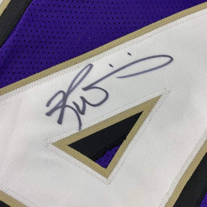 Autographed purple and white Williams 34 Championship Ready Jersey for display