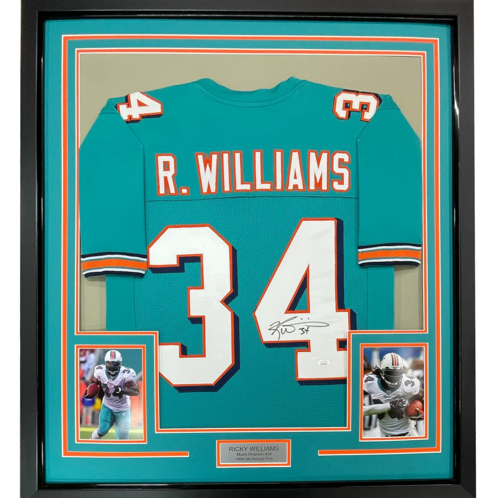 Framed autographed teal Miami Dolphins Ricky Williams jersey with R name