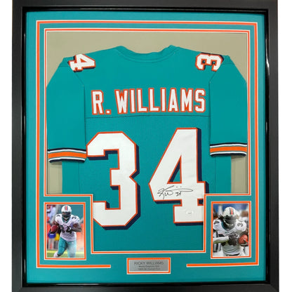Framed autographed teal Miami Dolphins Ricky Williams jersey with R name