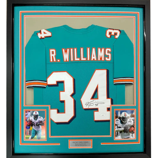 Framed autographed teal Miami Dolphins Ricky Williams jersey with R name