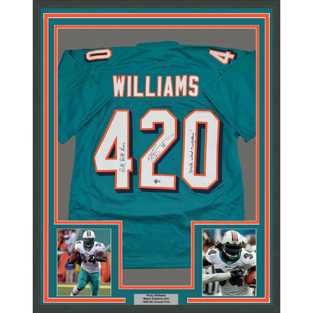 Framed signed Ricky Williams #420 inscribed Miami Dolphins teal jersey back