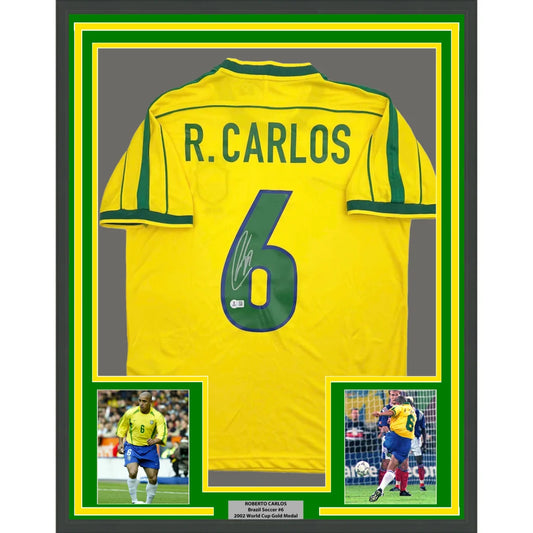 Framed Autographed Roberto Carlos 35x39 Brazil Yellow Soccer Jersey Beckett BAS COA | Hall of Fame Sports Memorabilia | vintageantiquesgifts.com
