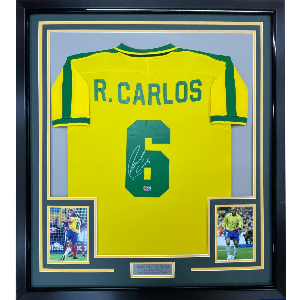 Framed Autographed Roberto Carlos Brazil 35x39 Yellow Retro Soccer Jersey Beckett BAS COA | Hall of Fame Sports Memorabilia | vintageantiquesgifts.com