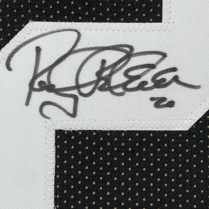 Autographed black and white Steelers jersey wall art with 5x7 photos, professionally framed