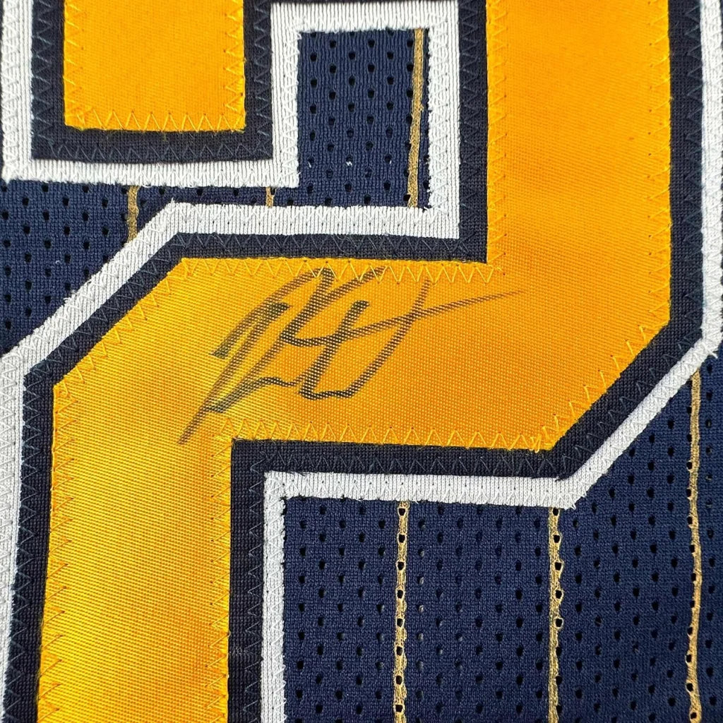 Autographed dark blue and yellow Pacers jersey ready to hang on your wall