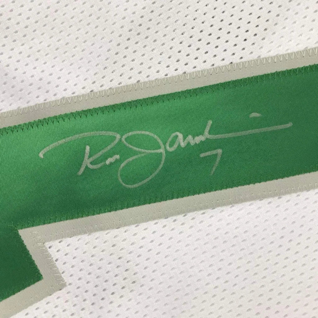 White sports jersey with green stripe and signature from Ron Jaworski Eagles jersey